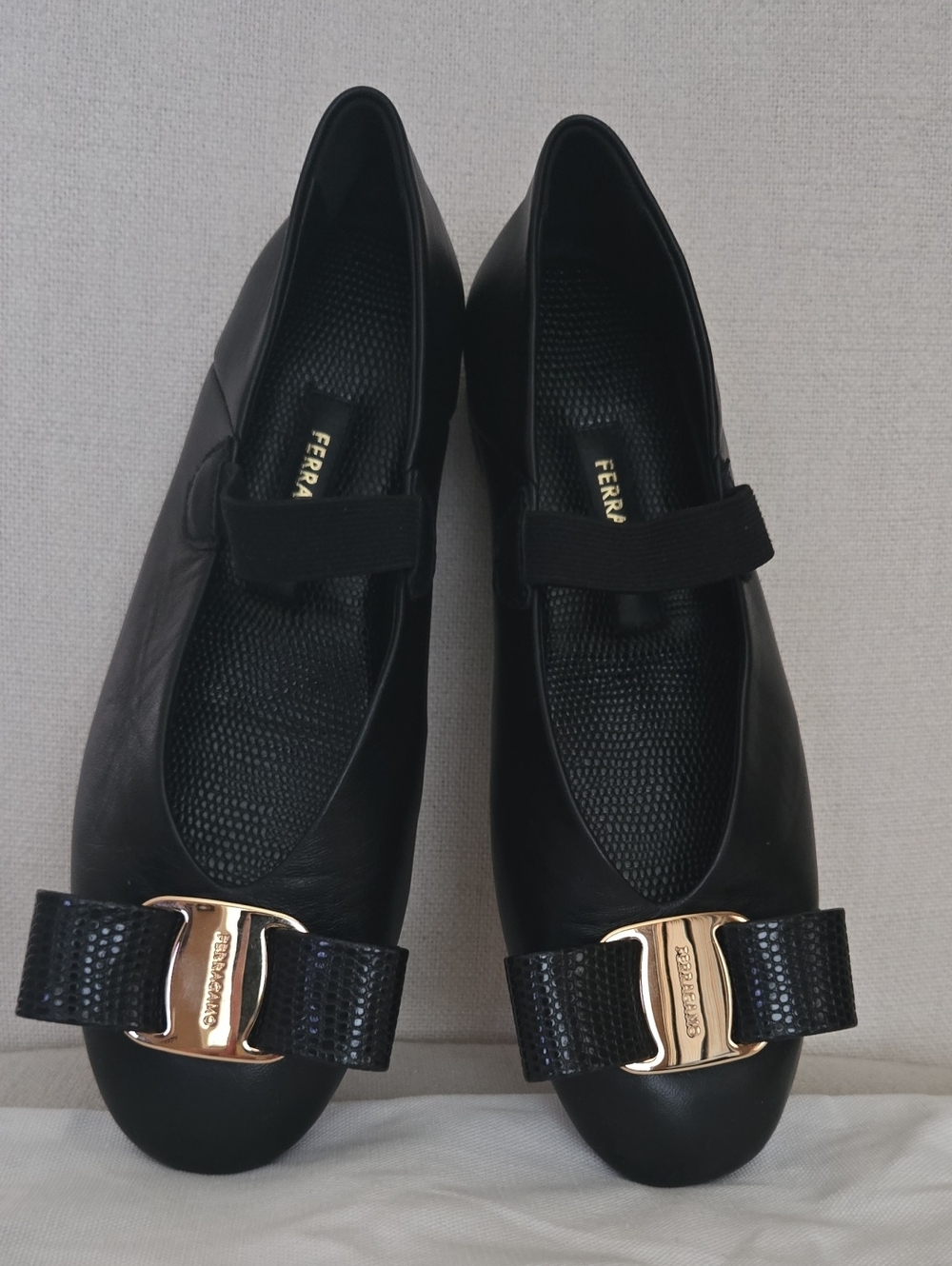 Salvatore Ferragamo Black Leather Bow Flats with Gold Hardware